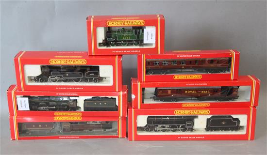 Five Hornby 00 gauge locomotives and two coaches; all 7 boxed